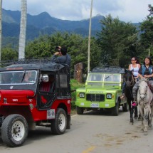 Red Willys with colombian tourists